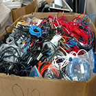 large box of sorted electronic waste